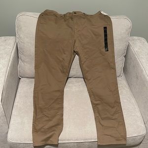 Banana Republic Tan Khaki Color Travel Jean (Chino Style), NWT, never worn.